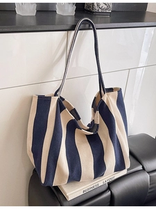 Minimalist striped canvas tote bag with large capacity and navy vertical stripes for commuting