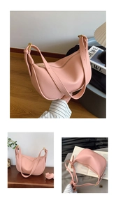 Macro detail of pink pebble leather texture and gold ring buckle on a hobo bag