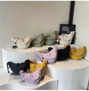 Detailed display of colorful nylon crescent crossbody bags in various trendy pastel shades