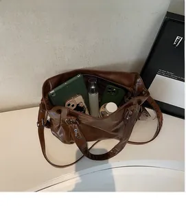 Brown vintage faux leather tote bag interior showing large capacity for tablet and items