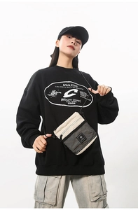 Streetwear look featuring a beige mesh utility crossbody bag with black tactical details