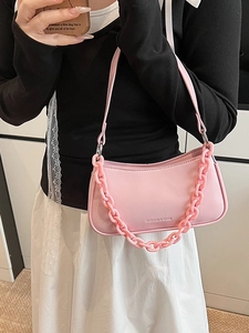 Pink PU leather baguette dumpling bag with stylish acrylic chain and long shoulder strap