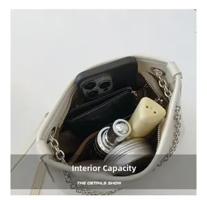 Capacité interne du sac seau blanc avec vue sur les poches intérieures et l'espace