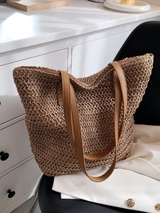 Sac fourre-tout en paille tressée marron avec lanières en cuir pour la plage et l'été