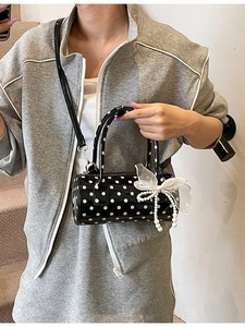 Polka dot cylinder bag with pearl bow decoration and detachable long shoulder strap