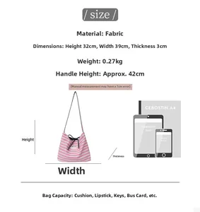 Size guide for striped canvas tote bag showing 32x39x3cm dimensions and capacity comparison