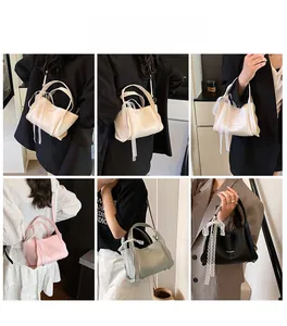 Lace-decorated mini bucket bags in white, pink, green, and black with crossbody straps