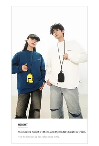 Mini crossbody neck pouches in yellow and black styled with urban outdoor streetwear