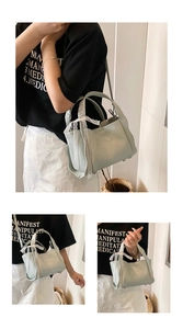 Detail showing the light green lychee pattern leather bag with a white lace bow accessory