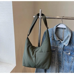 Army green nylon hobo bag featuring a large capacity design with adjustable wide strap