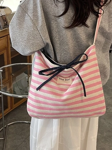 Pink and white striped canvas tote bag with a navy bow and See You label for women