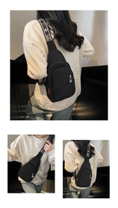 Detail view of lightweight black nylon chest bag with adjustable printed strap