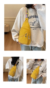 Three-angle view of a bright yellow nylon crossbody bag with purple and grey straps
