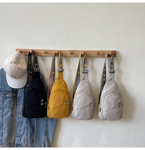 Detailed row of casual nylon chest bags with SJCHAO jacquard straps in four colors