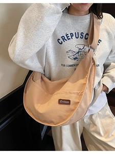 Minimalist apricot nylon crescent crossbody tote bag for women in casual daily style