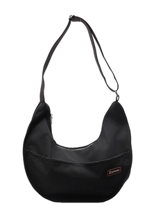 Minimalist black nylon crescent crossbody bag with adjustable strap and leather patch