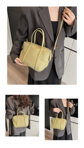 Detailed view of pale green lychee pattern PU leather tote with crossbody strap options