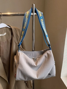 Large capacity nylon crossbody bag with striped wide shoulder strap in beige grey