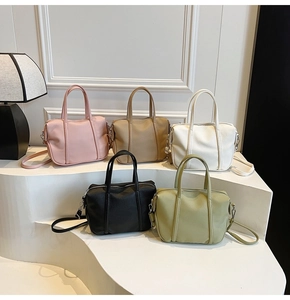 Detailed view of lychee texture handbags in pink, khaki, white, black, and green colors