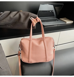 Pink lychee grain leather tote bag with silver hardware and detachable crossbody strap