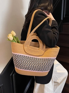 Large woven straw tote bag with pink stripes for beach and daily commuting