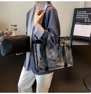 Detail of transparent PVC tote bag with removable black canvas inner pouch set