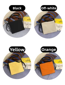 Canvas envelope crossbody bags shown in black, off-white, yellow, and orange colors