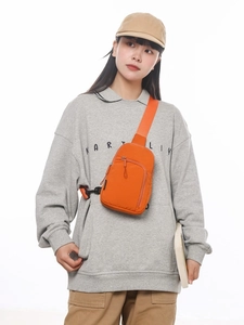 Helle orange wasserdichte Nylon-Umhängetasche mit verstellbarem Gurt und Frontreißverschluss