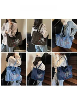 Gothic denim tote bag with spider web embroidery shown from multiple angles on a model
