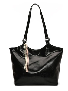 Large black glossy leather tote bag with embossed lettering and decorative tennis keychain