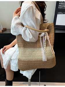Large straw tote bag with gradient weave design and decorative charms for women