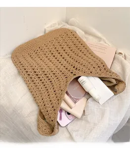 Handwoven khaki cotton tote bag showing large capacity for cosmetics and accessories