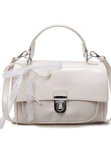 Minimalist cream square crossbody bag with pearl chain and lace bow decoration