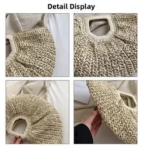 Detail view of woven straw handbag featuring cutout handles and textured fan-shaped body