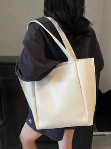 Minimalist large white PU leather tote bag shown on model for daily office commute