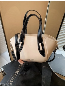 Beige and black contrast crossbody pillow bag with FASHION & BAGS logo and strap