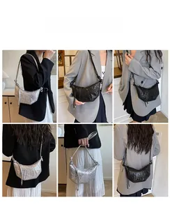Detail shots of large sequin crescent bag with knot straps in silver and black colors