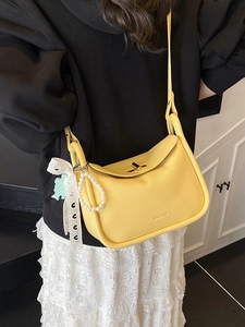 Fashionable bright yellow lychee leather crossbody bag with pearl charm and lace bow