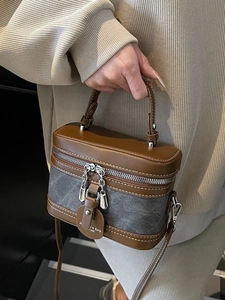 Vintage brown leather and canvas vanity box bag with crossbody strap and top handle