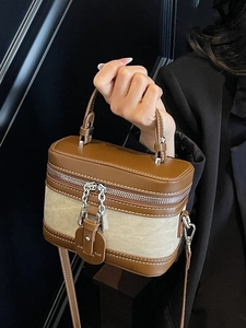 Chic beige fabric vanity box bag with brown leather trim and top handle crossbody strap