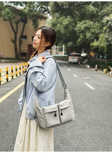 Waterproof nylon messenger bag with double front pockets for daily commuting use