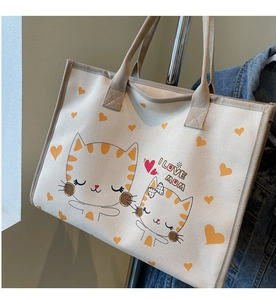 Détail du sac cabas en toile avec texte 'I LOVE MOM', imprimé chat et lanières brunes