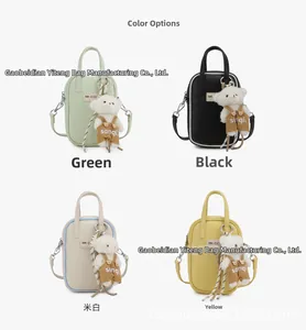 Mini crossbody phone bags in four colors with cute plush bear charms and chain straps