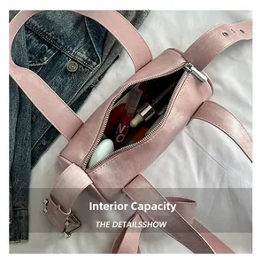 Pink Boston bag interior showing spacious capacity for cosmetics and skincare bottles
