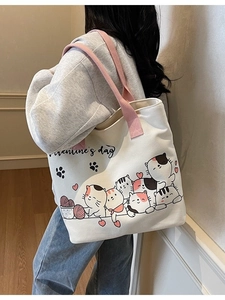 Large white canvas tote bag with pink straps and cartoon cat Valentine's Day print