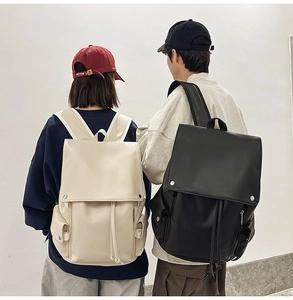 Detailed view of cream PU leather backpack with magnetic flap and drawstring closure
