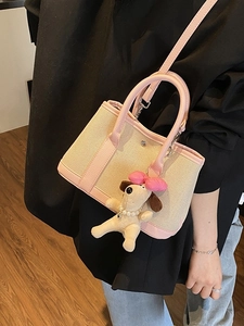 Canvas bucket bag with pink leather trim and cute puppy charm for summer women fashion