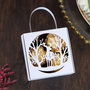 Detailed laser-cut white Christmas elk candy box with reindeer silhouette and carry handle
