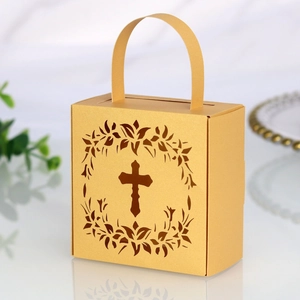Detailed laser-cut hollow cross design on gold pearlescent paper wedding favor box