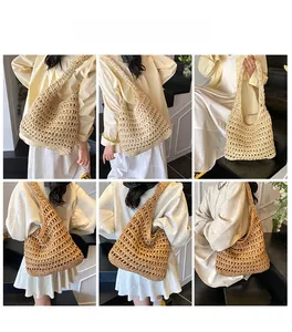 Detail view of large hollow straw tote bag in beige and brown for beach vacations